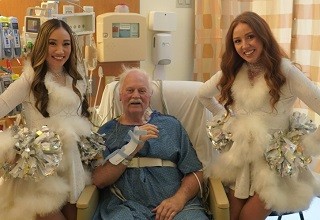 Seattle Seahawks dancers and patient